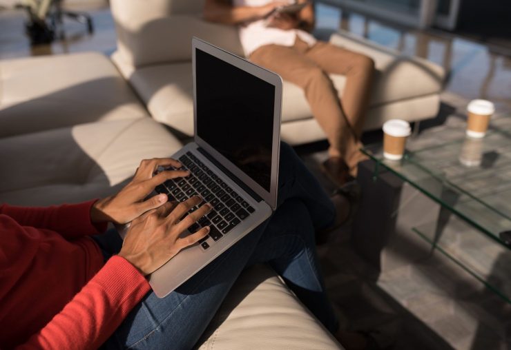 female-executive-using-laptop-in-the-office-with-c-NVS23C8-1.jpg